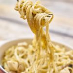 close up photography of pasta with white sauce